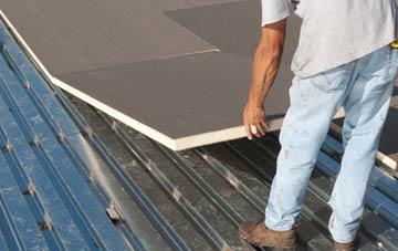 benefits of insulating Ellel flat roofing